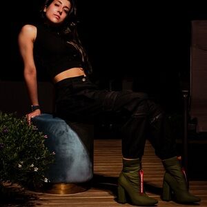 Army Green Puffer booties “Poster Girl Catching Flights”